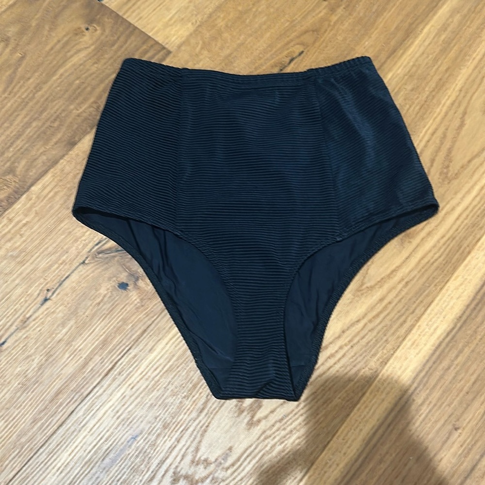 American Apparel High-rise bikini bottom. Size large. Black. Like new.